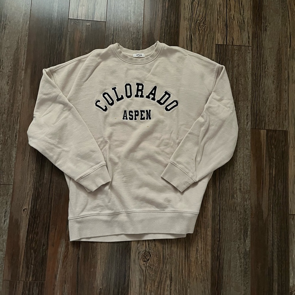 Tan colored garage sweatshirt